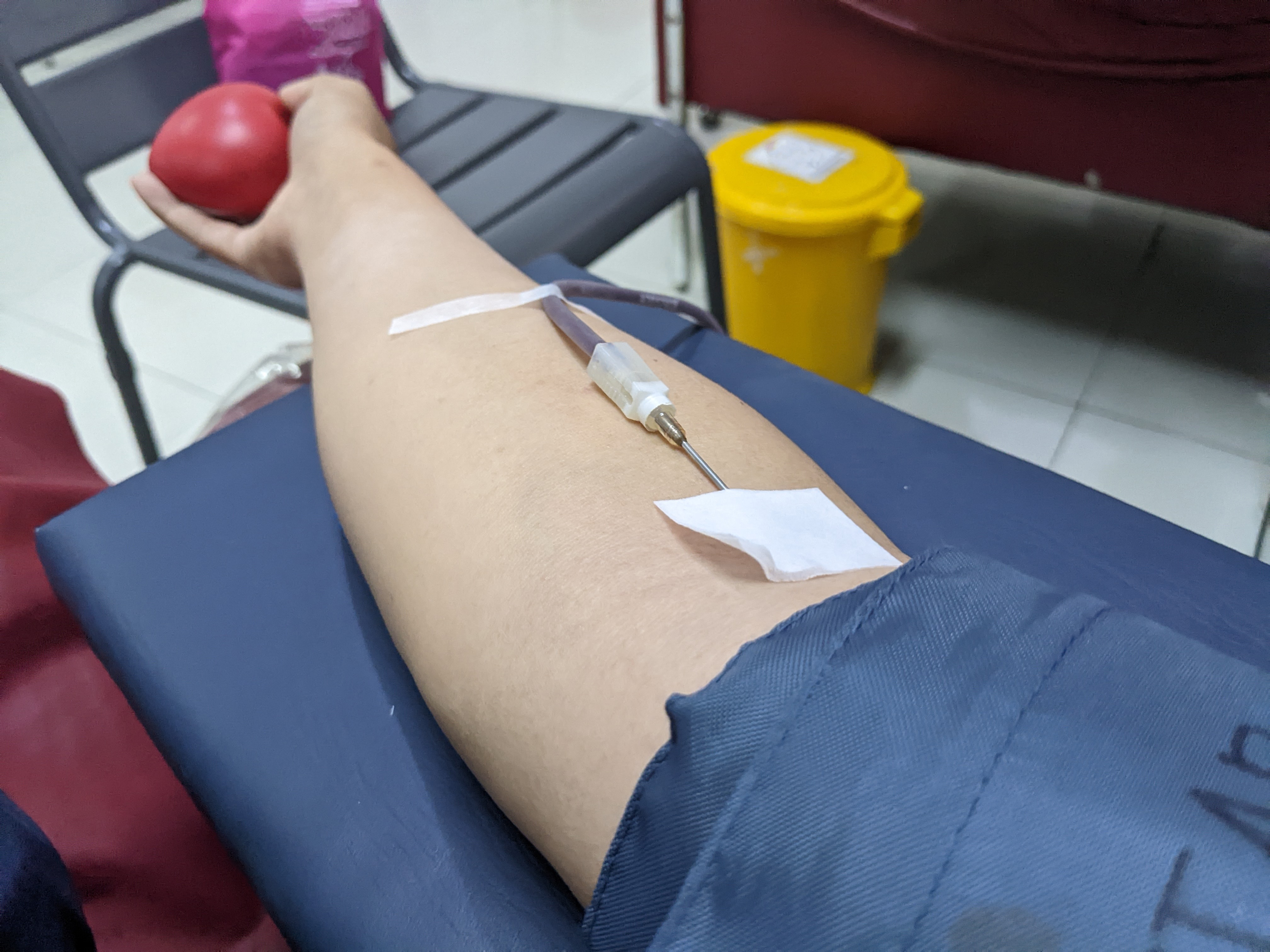Blood donation process - arm with needle for transfusion